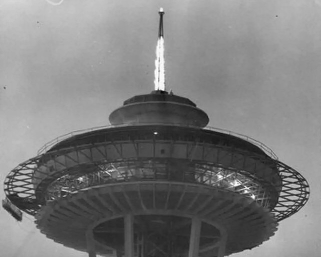 Flames atop the Space Needle